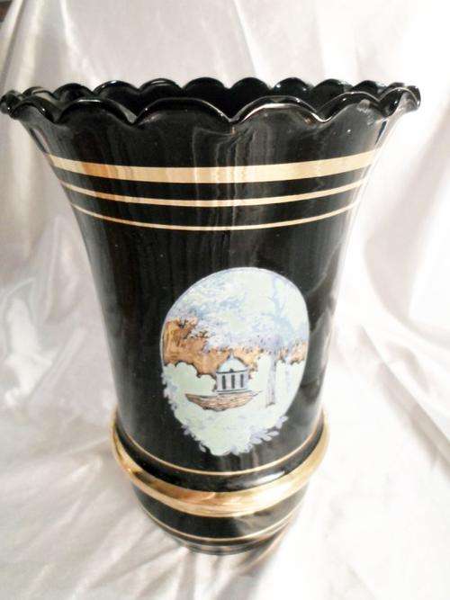 Hand blown glass vase with tree and floral decorations